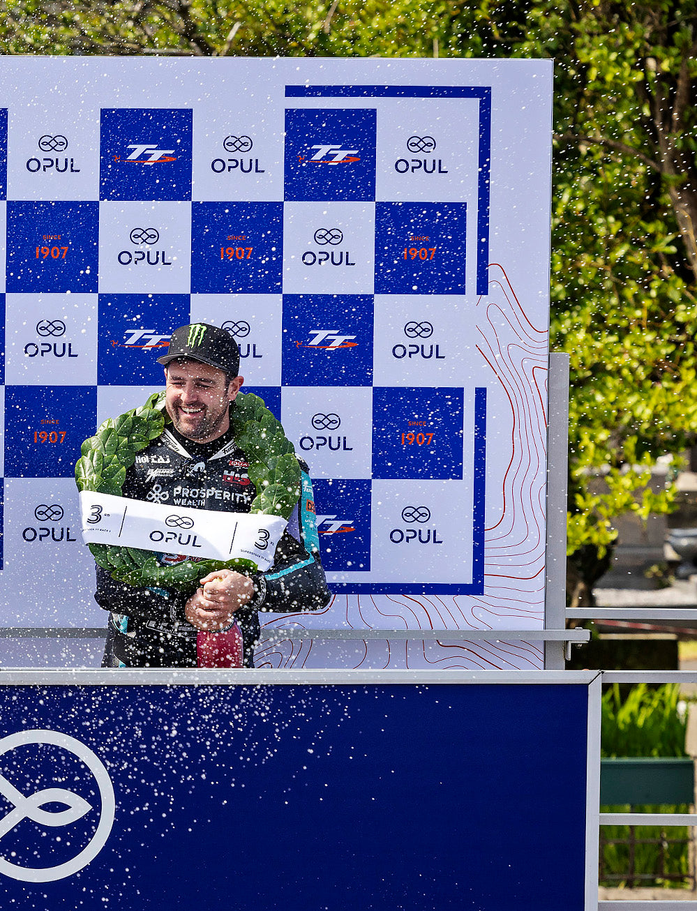 Isle of Man TT Races 2025 Opul Superstock TT Race 2  Podium Backdrop